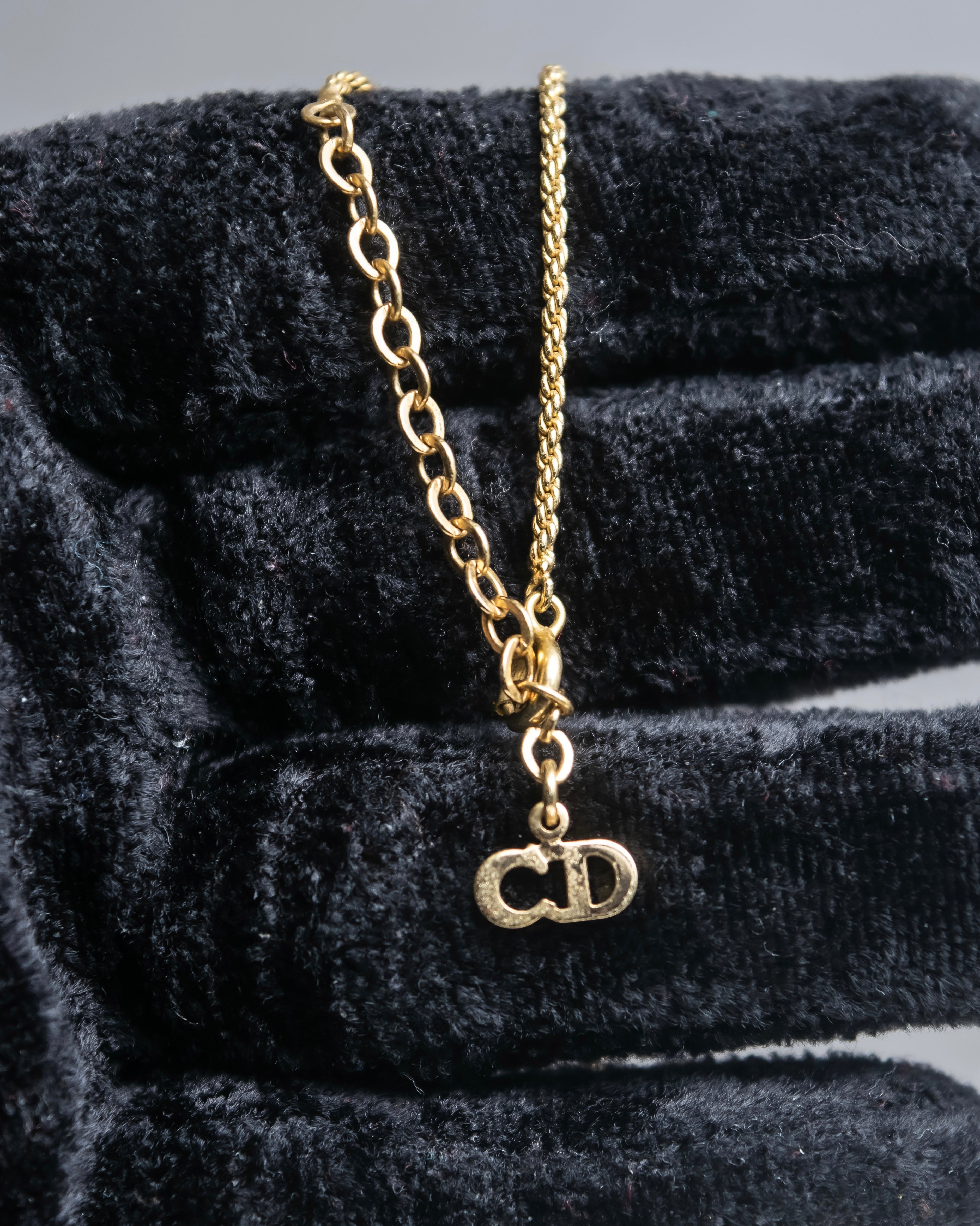 "Christian Dior" Rhinestone studded CD logo design in gold necklace