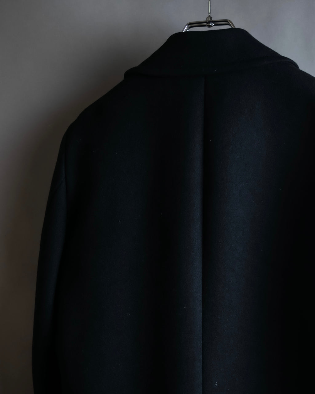 "JOHN LAWRENCE SULLIVAN"
 Large lapel double-breasted mid length coat