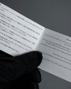 "Alexandar McQueen" Horseshoe motif red stone top ring