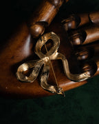 “Christian Dior“ 80’s-90’s CD-embossed ribbon brooch