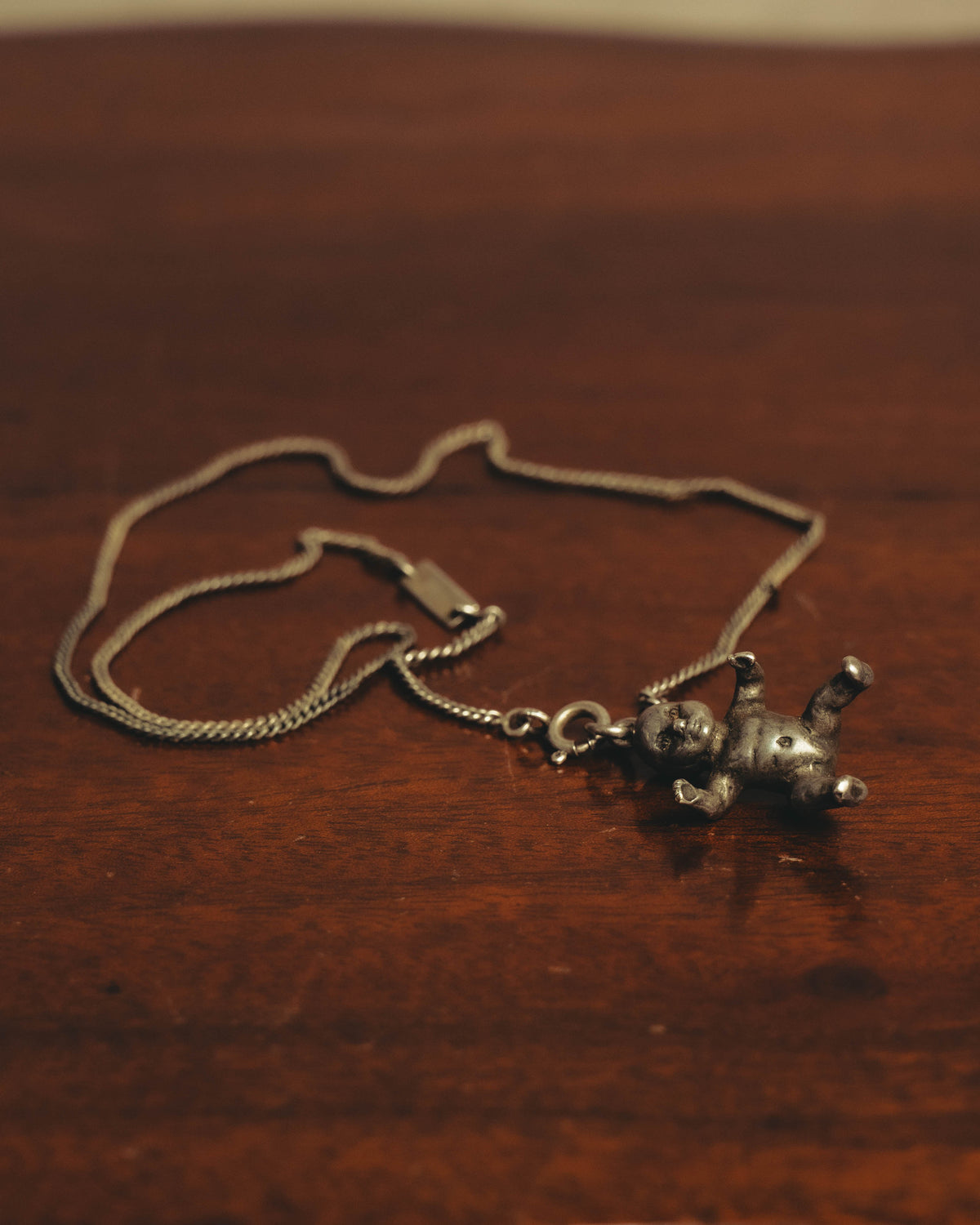 "Saint Laurent" 10's-20's Sculptural doll pendant necklace