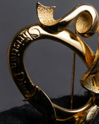 "Christian Dior" Oval ribbon motif gold brooch