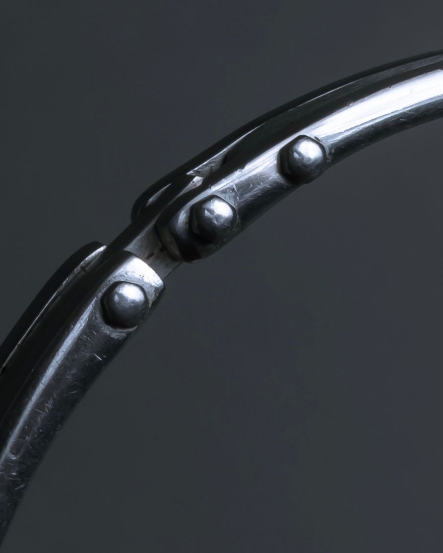 "Dolce & Gabbana" Curved rivet design silver metal bracelet