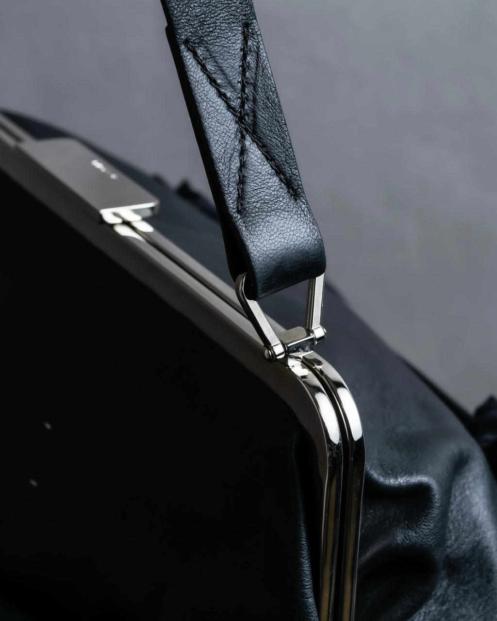 "MARNI" Side ribbon design rounded body leather bag