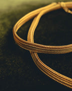 "Christian Dior" Gold tone braided knot costume jewelry necklace