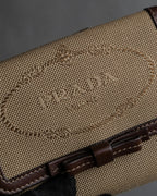 "PRADA" Logo engraved canvas＆leather combination short wallet