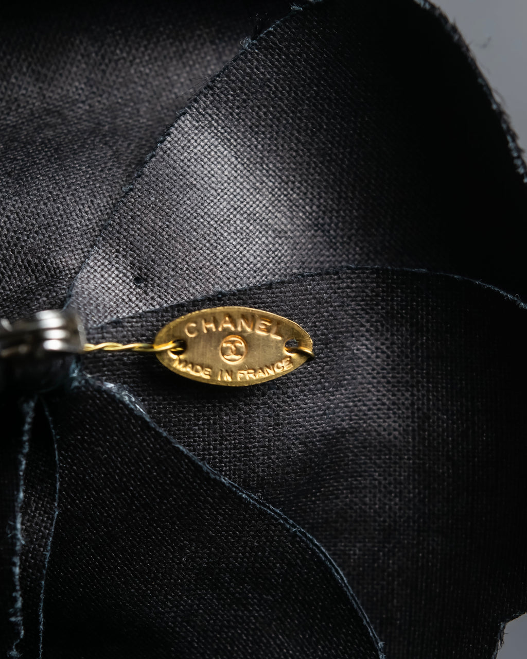 "CHANEL" Black camellia motif brooch