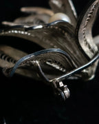 "Vintage petal motif broach"