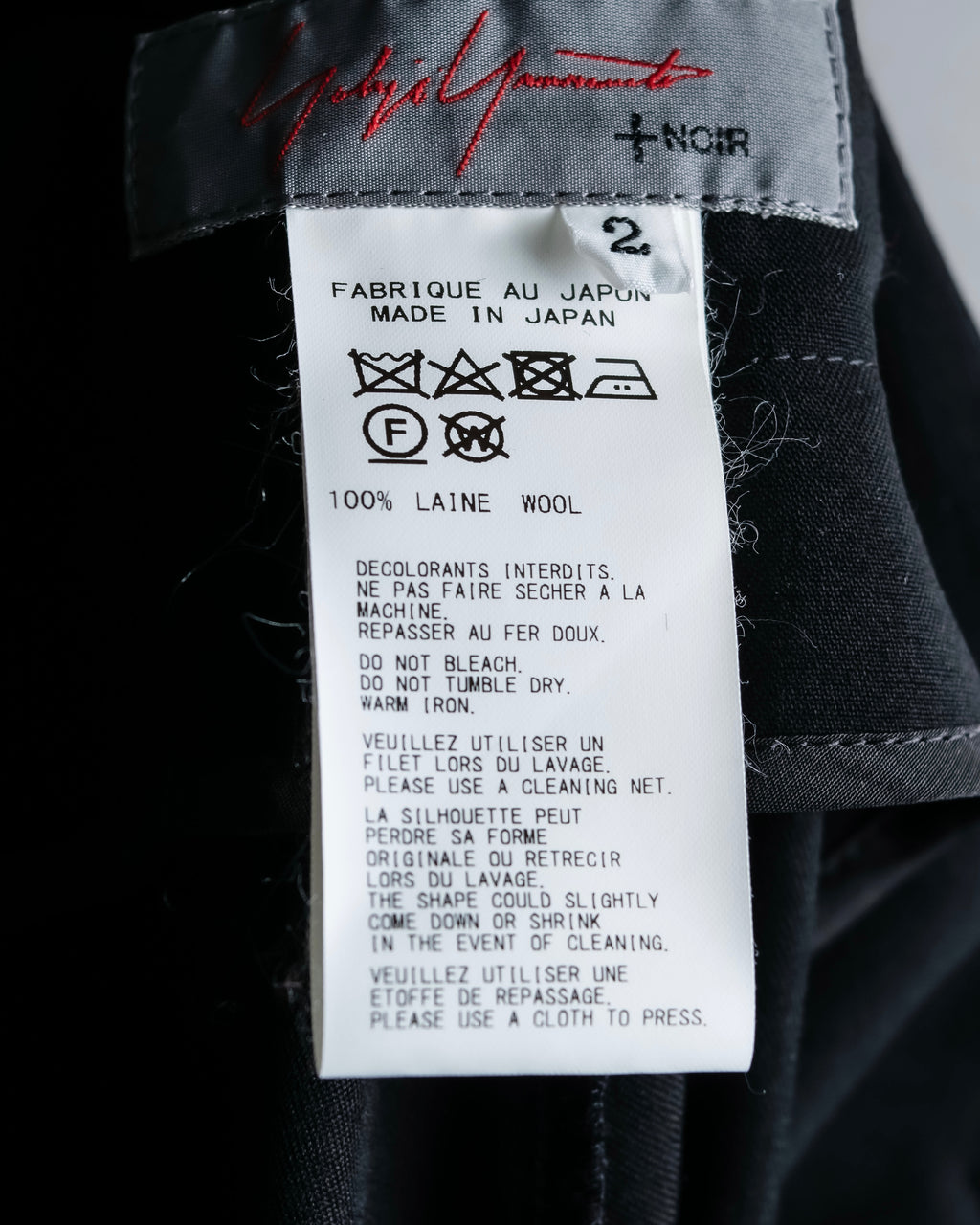 "YOHJI YAMAMOTO +NOIR" Asymmetrical slit sarouel slacks