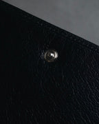 "YVES SAINT LAURENT" Stud-embellished monogram bi-fold wallet