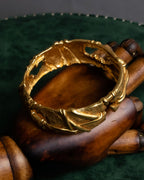 "Christian Lacroix" Sculptural detail gold bracelet