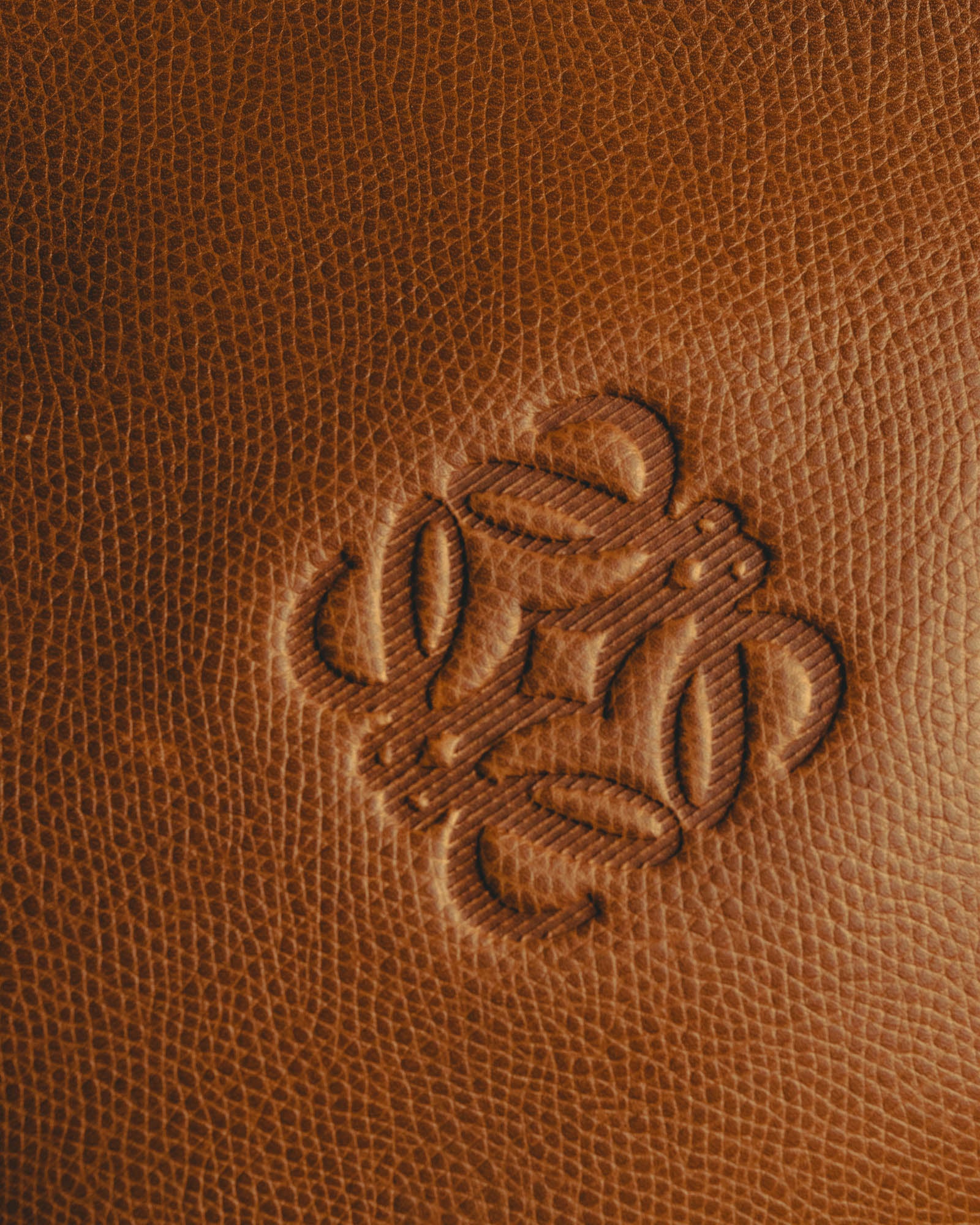 "LOEWE" 80s–00's logo embossed leather handbag