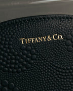 "Tiffany & Co." 10's-20's Embossed leather wristlet wallet