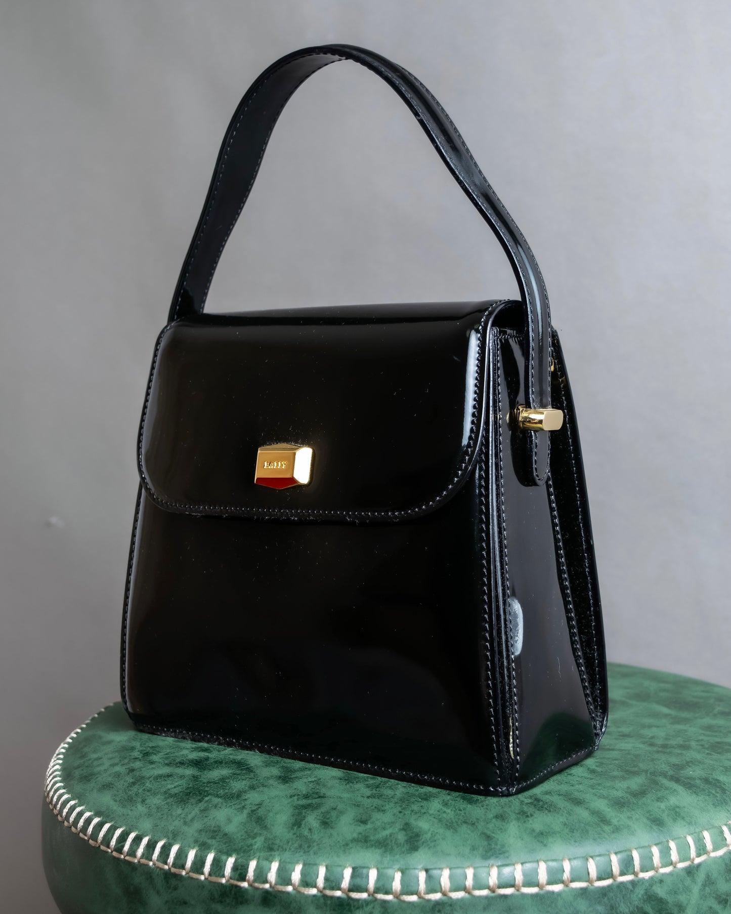 "BALLY" Trapezoid design patent leather one handle leather bag