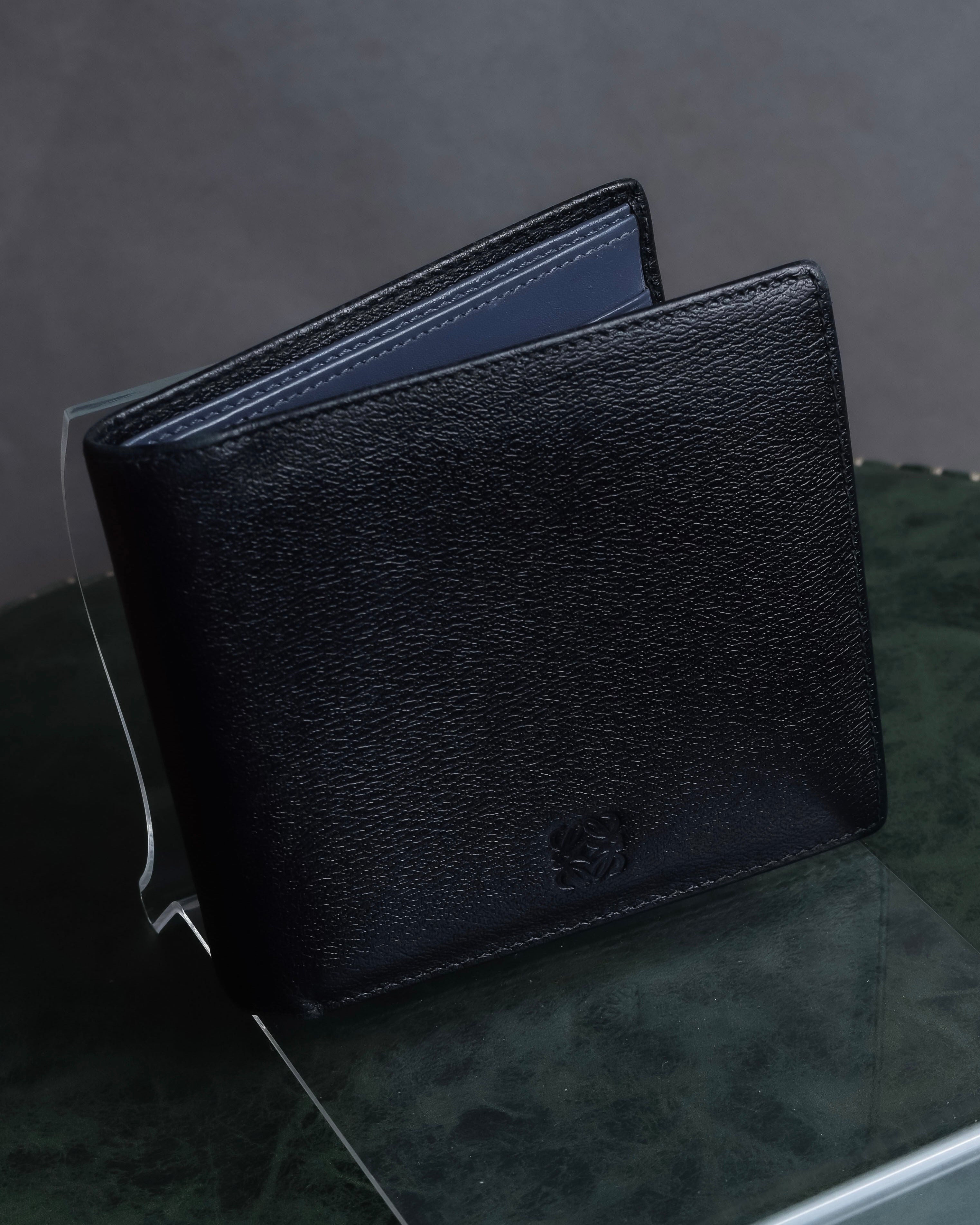 "LOEWE" Logo engraved bi-fold leather wallet