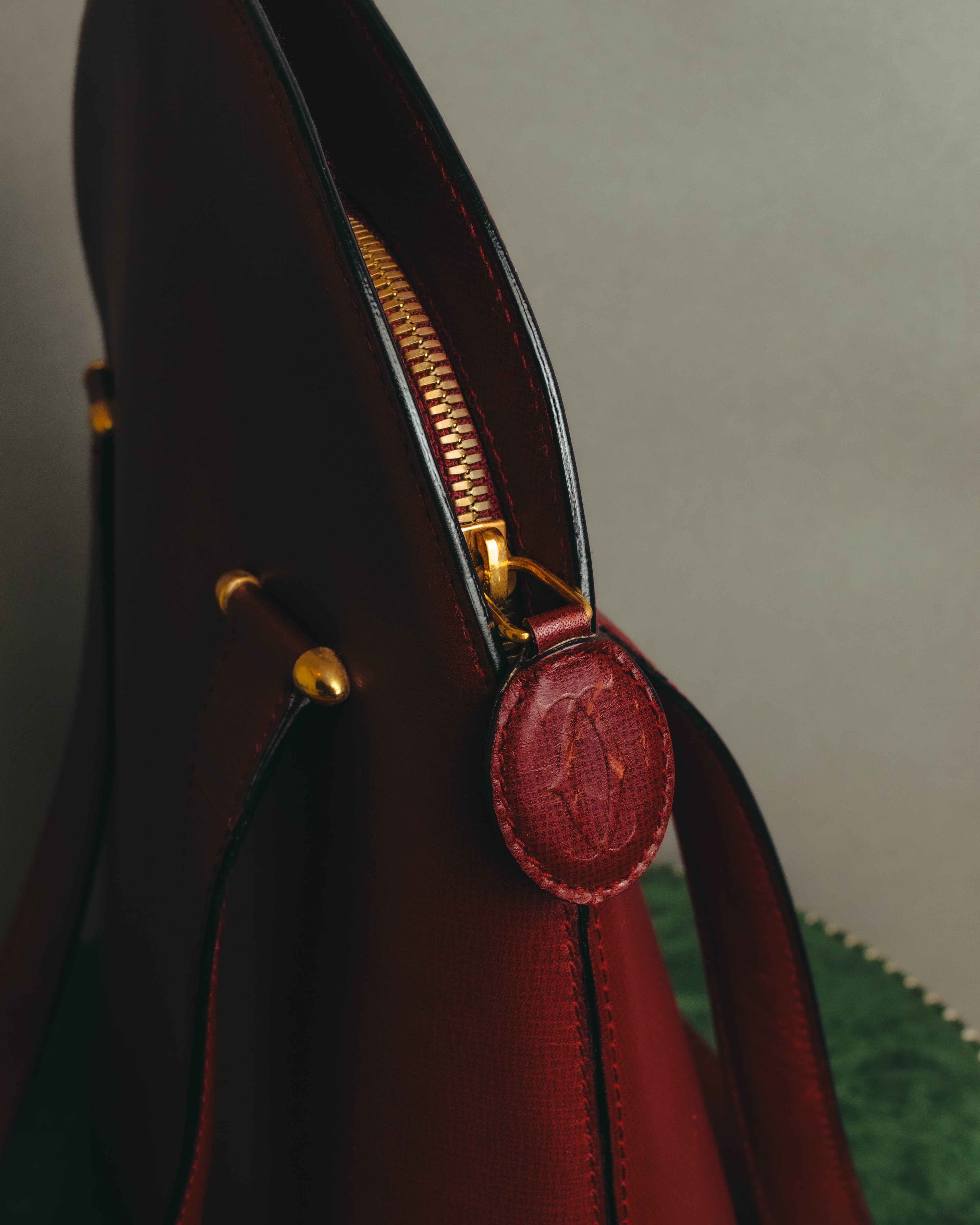 "Cartier" 80's-90's Bordeaux leather handbag