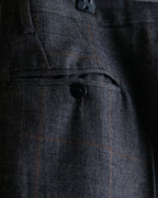 Pantalones vintage con detalle de botones, ventana de estampado a cuadros