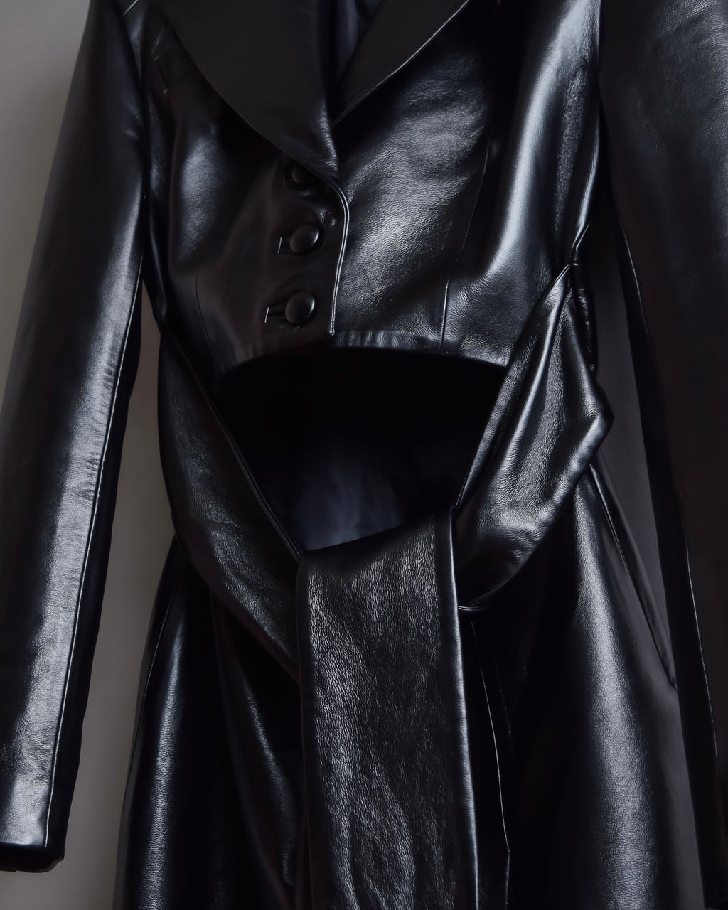 "MATÉRIEL TBILISI" Draped belted synthetic leather long jacket