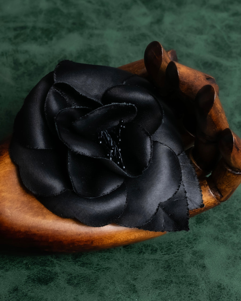 "CHANEL" Black camellia motif brooch