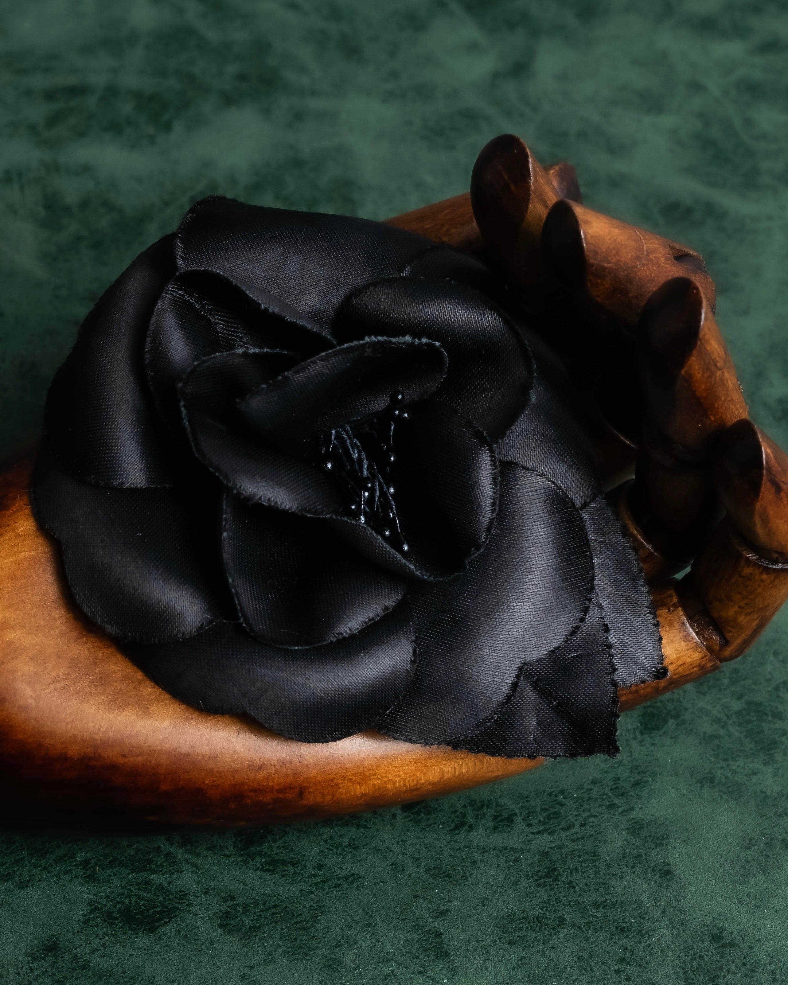 "CHANEL" Black camellia motif brooch