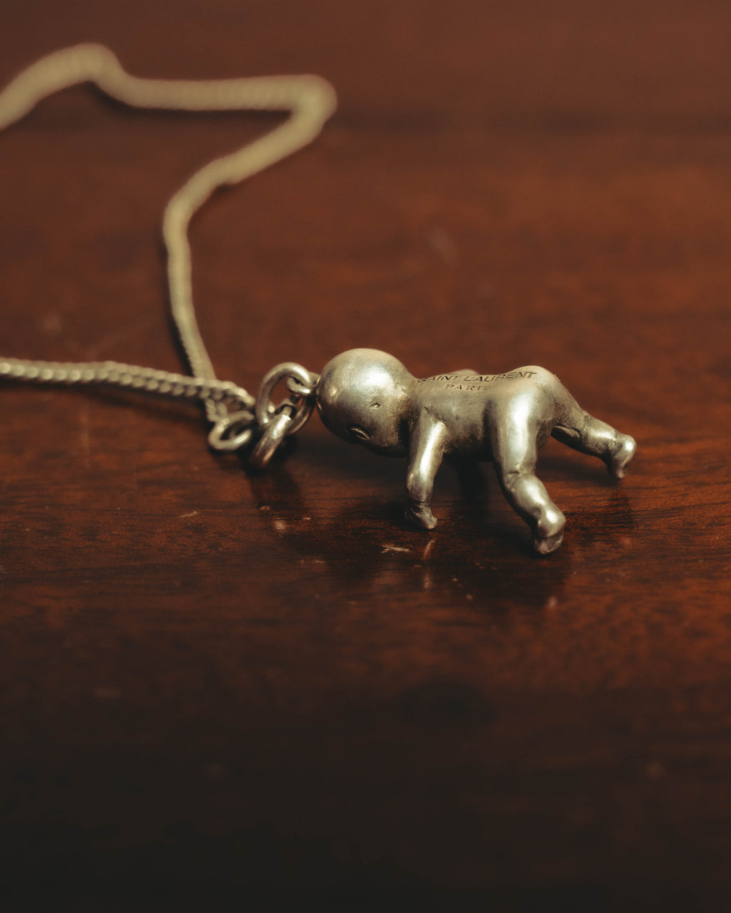 "Saint Laurent" 10's-20's Sculptural doll pendant necklace