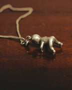 "Saint Laurent" 10's-20's Sculptural doll pendant necklace