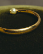 "DIOR" 10's-20's Gold tone pearl star open bangle