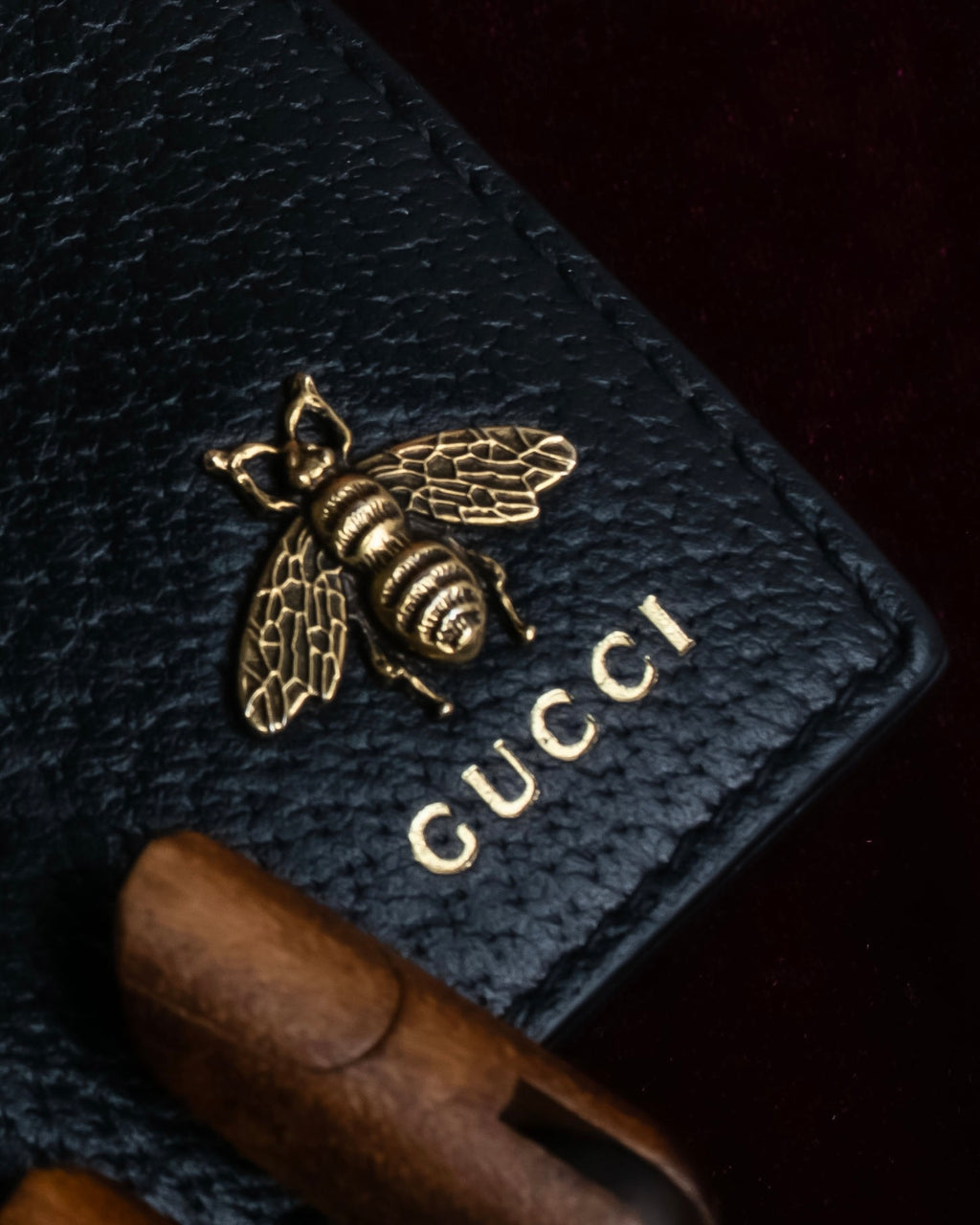 "GUCCI" Gold bee motif animalier bi-fold leather wallet