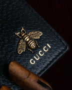 "GUCCI" Gold bee motif animalier bi-fold leather wallet