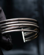 “PHILIPPE AUDIBERT” Crossed 5 line silver bangle
