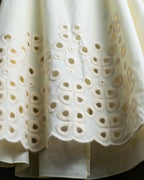 "FENDI" hole pattern and tack designed skirt