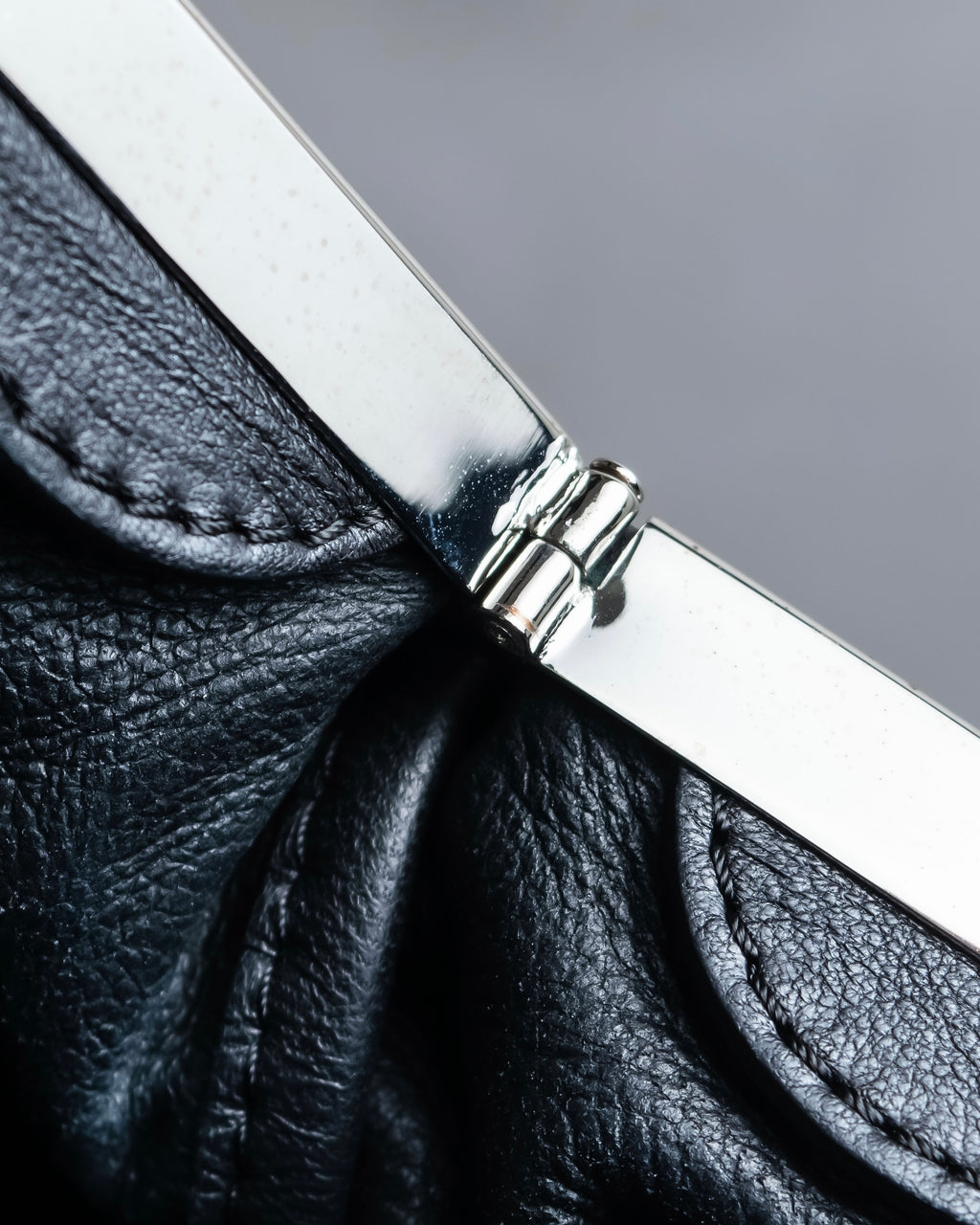 "MARNI" Side ribbon design rounded body leather bag