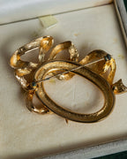 "Christian Dior" Oval ribbon motif gold brooch