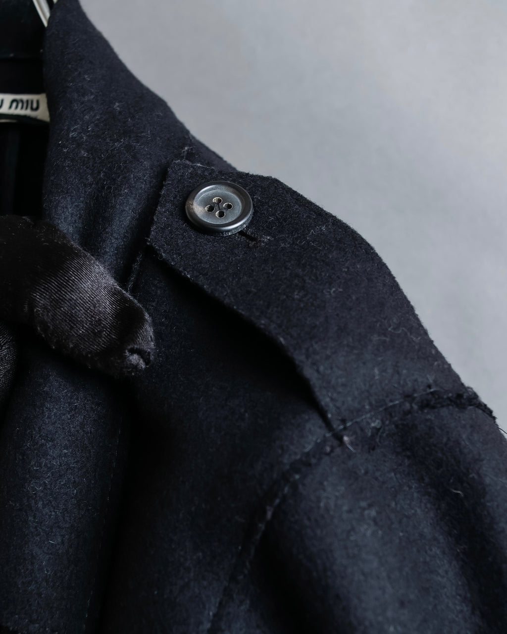 "MIU MIU" Crest brooch design belted trench coat