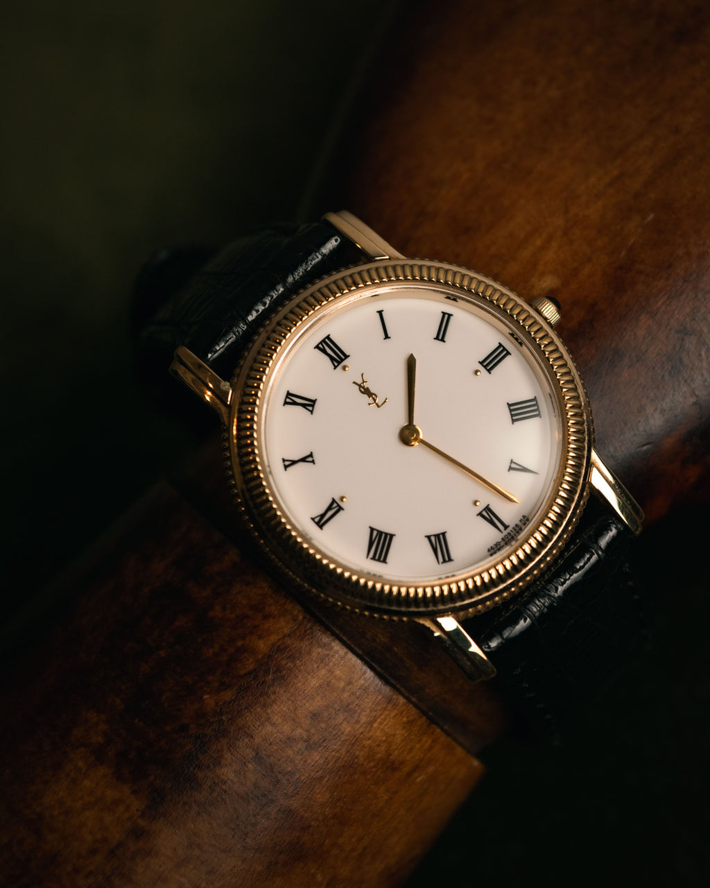 “Yves Saint Laurent” 80’s-90’s coin edge quartz leather watch