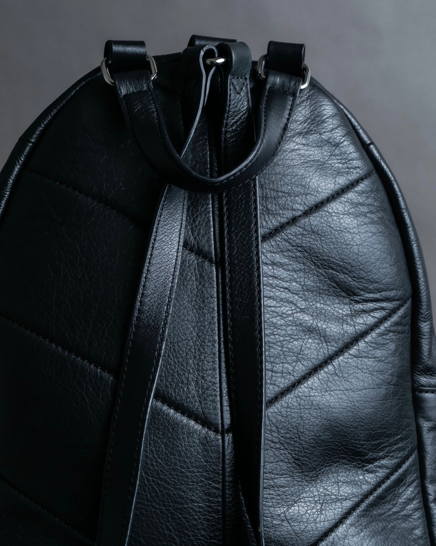 "DIESEL" Decorative zip design leather backpack