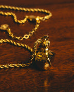 "Christian Dior" 80's-90's Gold tone bottle pendant necklace