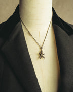 "Saint Laurent" 10's-20's Sculptural doll pendant necklace