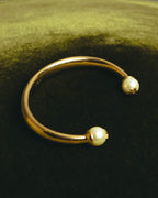 "DIOR" 10's-20's Gold tone pearl star open bangle