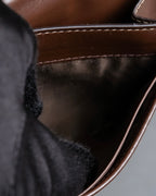 "PRADA" Logo engraved canvas＆leather combination short wallet