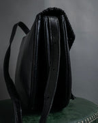 "YVES SAINT LAURENT" 80's-90's Logo engraved tassel detail bag