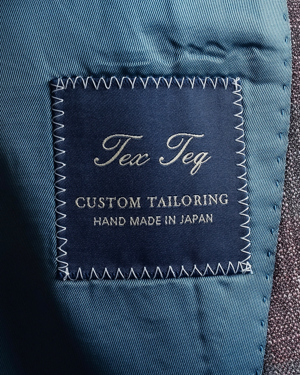 "Tex Teq" Gradient check pattern tailored jacket