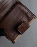 "PRADA" Logo engraved canvas＆leather combination short wallet