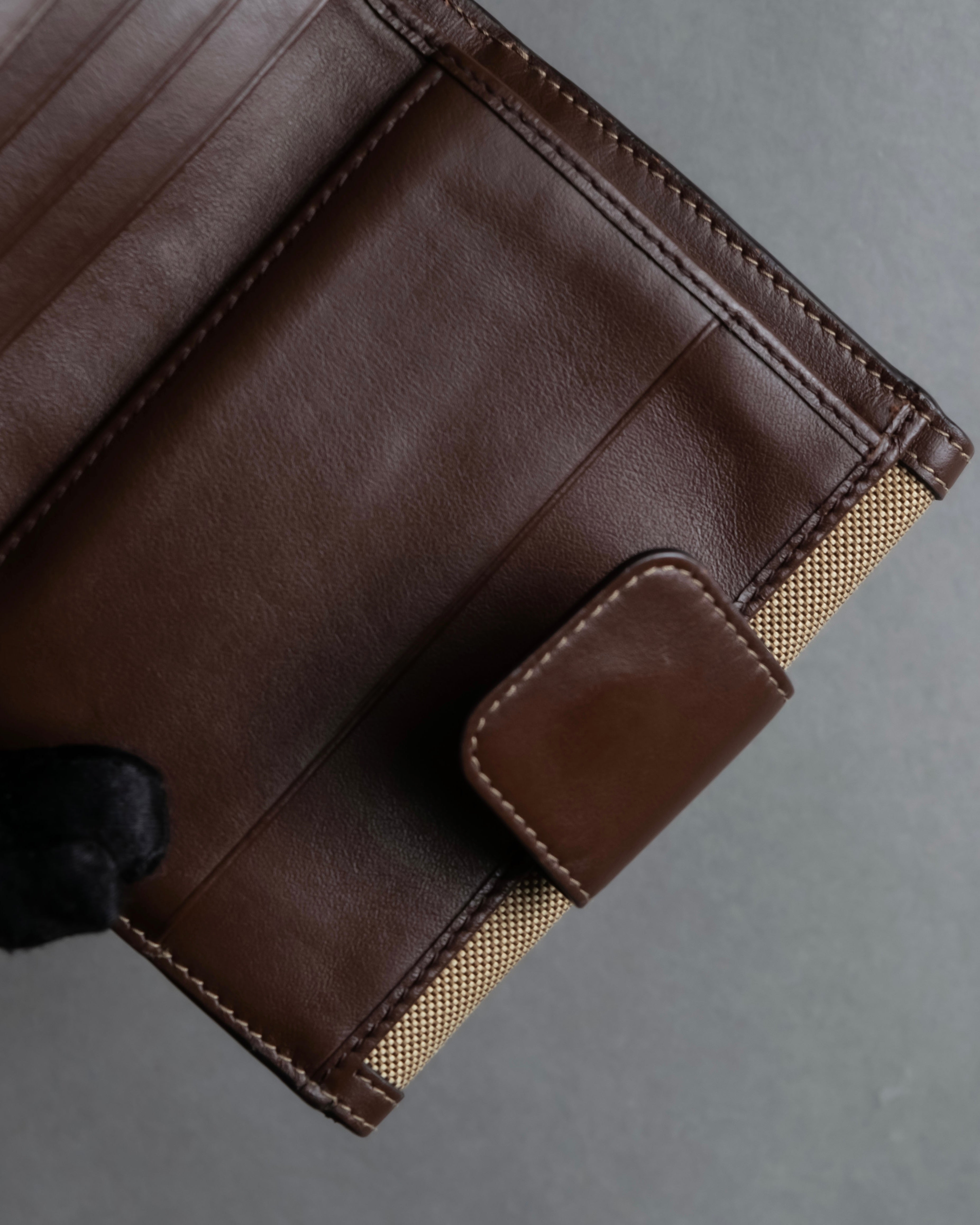 "PRADA" Logo engraved canvas＆leather combination short wallet