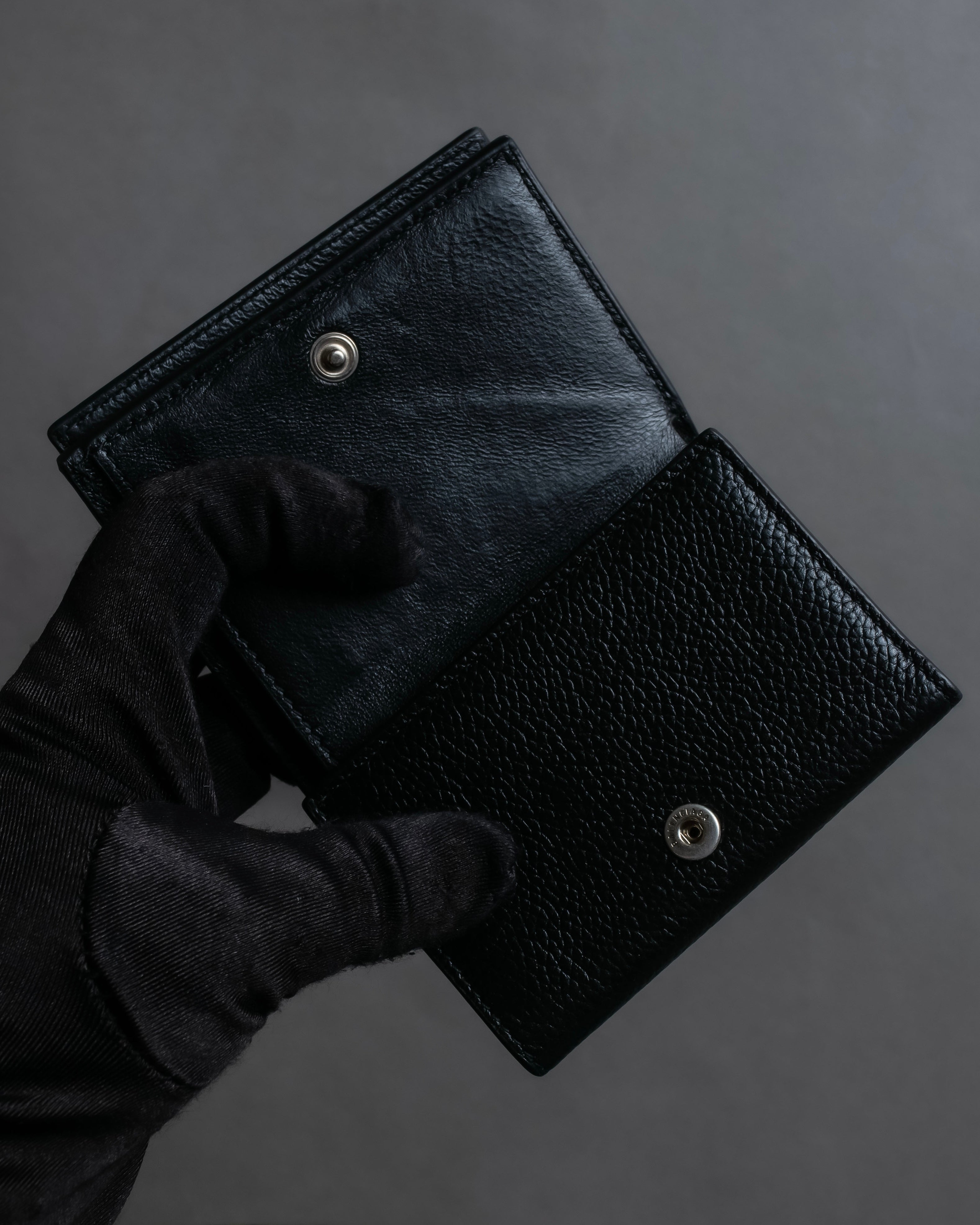 "BALENCIAGA" Logo engraved compact leather tri-fold wallet