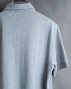 "BURBERRY" Knight logo engraved metal button polo shirt