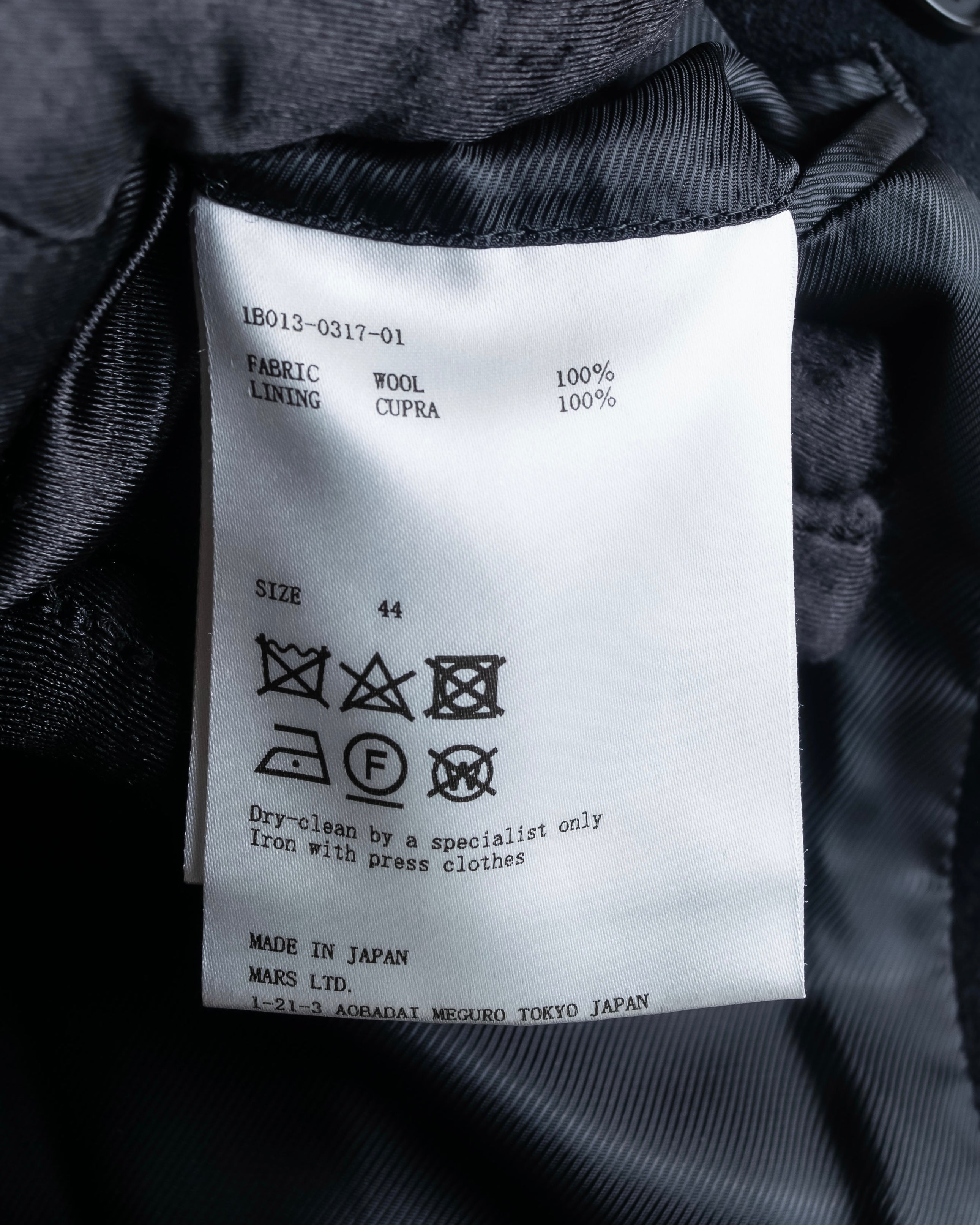 "JOHN LAWRENCE SULLIVAN"
 Large lapel double-breasted mid length coat