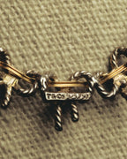 "Tiffany & Co." 80's-90's Sculptural triple bow necklace