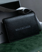 "BALENCIAGA" Logo engraved compact leather tri-fold wallet