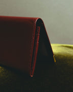 “Cartier” 90’s Must de Cartier burgundy embossed leather bifold wallet